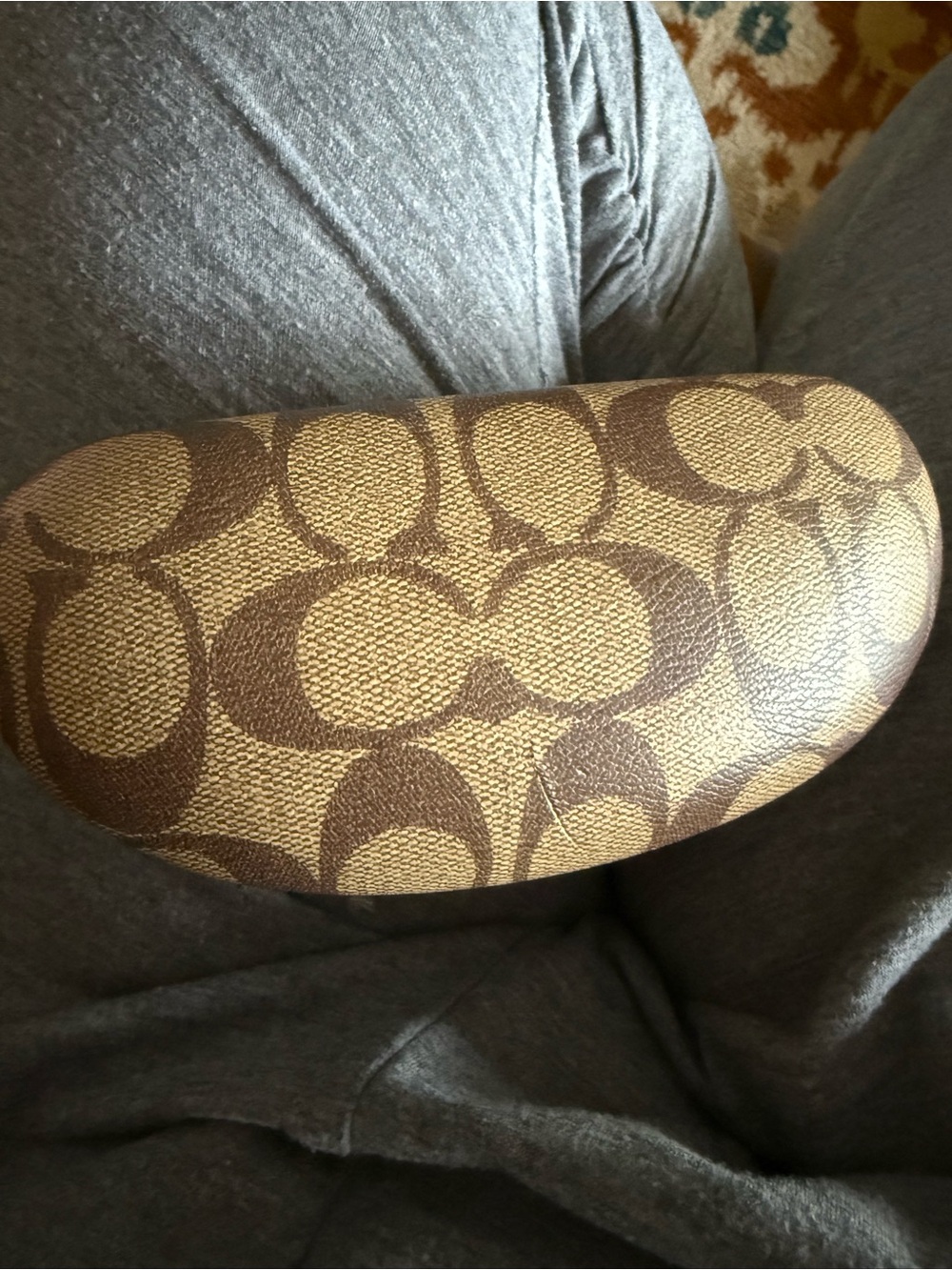 Coach prescription glasses with Signature 'C' Pattern Eyeglass Case.